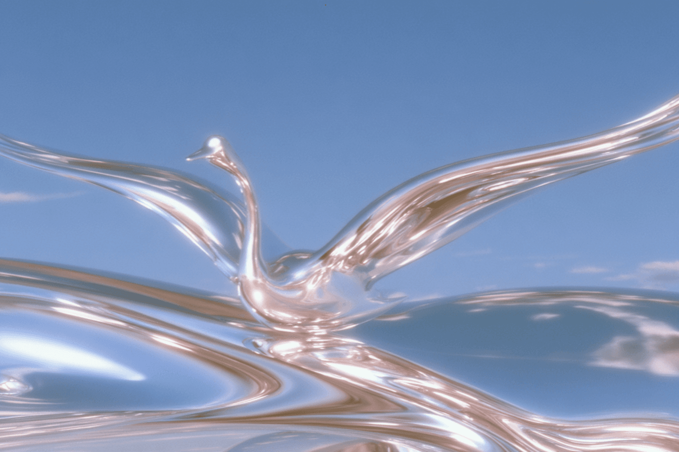 An abstract silver bird with outstretched wings against a blue sky